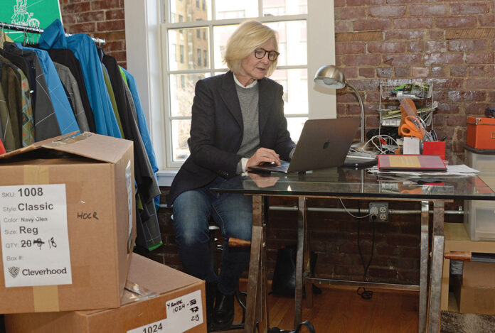 SUSAN MOCARSKI, owner and principal designer of Providence-based Cleverhood LLC, is eager to make trips overseas again so the company can better connect with distributors and large retailers in markets where Cleverhood's outerwear is already popular. / PBN FILE PHOTO/ELIZABETH GRAHAM