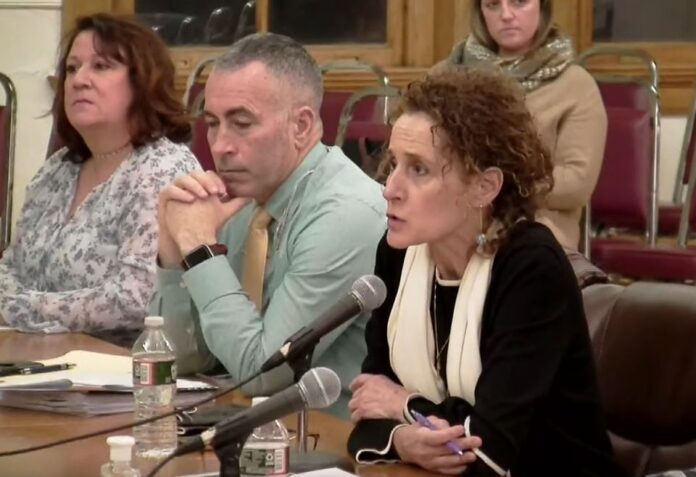 WOONSOCKET MAYOR Lisa Baldelli-Hunt, right, speaks during Monday's City Council meeting about her resolution for the city to seek bids for a new public safety complex. / SCREENSHOT VIA YOUTUBE.COM