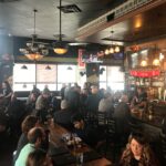 MURPHY'S DELI & BAR was at maximum capacity around noon Thursday right as when the Providence College men's basketball team tipped off. / PBN PHOTO/JAMES BESSETTE
