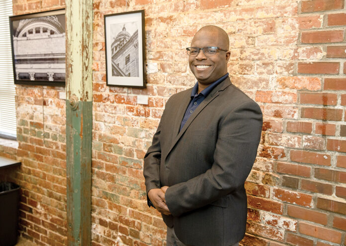 STEADFAST EFFORT: Despite serving in a number of different roles throughout his career, Larry Warner, chief impact and equity officer at United Way of Rhode Island, has always worked to better his community. / PBN PHOTO/TRACY JENKINS