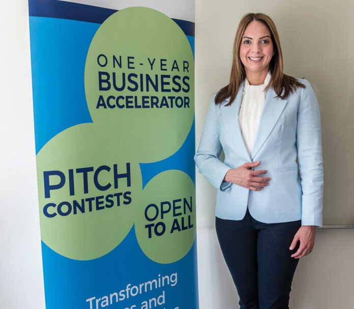 SETTING UP SHOP: Laura Guillén, the new Rhode Island executive director for Entrepreneurship for All, is forming a network of mentors and prospective program participants. / PBN PHOTO/MICHAEL SALERNO