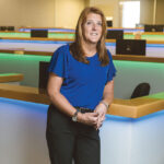 RAPID ASCENT: Suzanne Morrow has risen through the ranks from client services program manager to senior vice president, the company’s second-highest position, in her six years at InsureMyTrip in Warwick.  / PBN PHOTO/RUPERT WHITELEY
