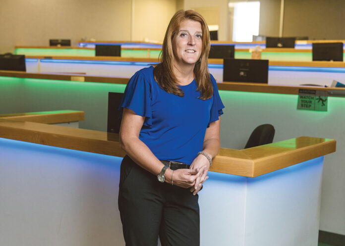 RAPID ASCENT: Suzanne Morrow has risen through the ranks from client services program manager to senior vice president, the company’s second-highest position, in her six years at InsureMyTrip in Warwick.  / PBN PHOTO/RUPERT WHITELEY