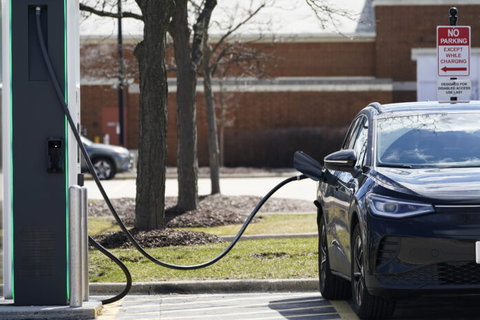 RHODE ISLAND residents, small businesses, nonprofits and public sector entities will be eligible to receive rebates for the purchase or lease of electric vehicles, as part of the state's electric vehicle rebate program DRIVE EV. / AP FILE PHOTO/NAM Y. HUH