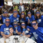 CAREY, RICHMOND & VIKING INSURANCE employees dress up as superheroes Wednesday during Providence Business News' 2022 Best Places to Work awards event. / PBN PHOTO/MIKE SKORSKI