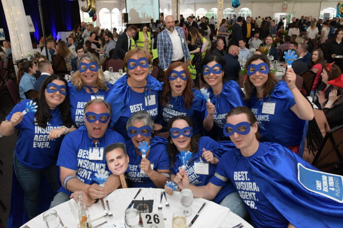 CAREY, RICHMOND & VIKING INSURANCE employees dress up as superheroes Wednesday during Providence Business News' 2022 Best Places to Work awards event. / PBN PHOTO/MIKE SKORSKI