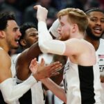 PROVIDENCE COLLEGE, according to president Rev. Kenneth R. Sicard, said the success of the men's basketball team may have influenced more students to attend PC this year. Pictured from left are now former PC players Justin Minaya, Al Durham, Noah Horchler and Nate Watson after defeating the University of Richmond March 19 in the NCAA Tournament's second round. / AP FILE PHOTO/FRANK FRANKLIN II