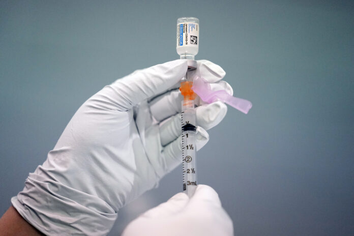 COVID-19 VACCINES will be made available for children ages 6 months to 5 years old in Rhode Island next week. / AP FILE PHOTO/MATT ROURKE