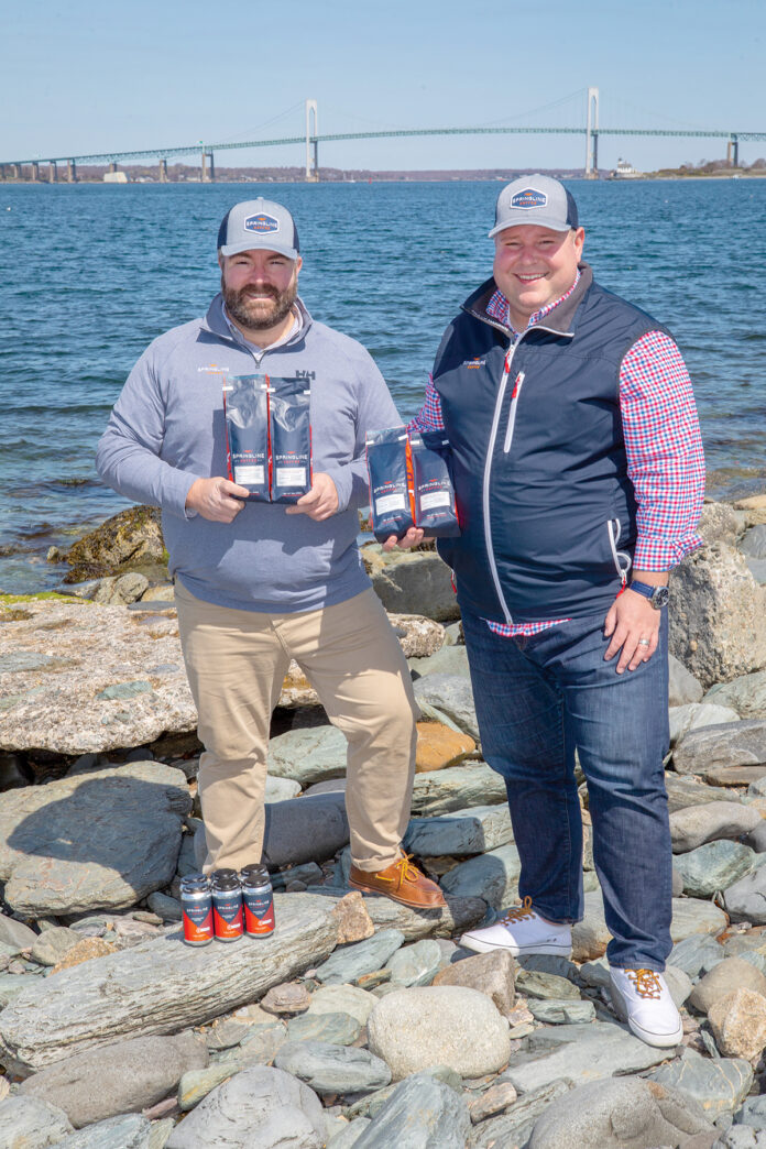 BOLD DUO: Rich Palizzolo, right, owner of Springline Coffee LLC in Newport, and his husband and business partner, Joe McCarthy, display some of their products. PBN PHOTO/KATE WHITNEY LUCEY