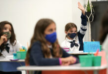 K-12 STUDENTS ACROSS MASSACHUSETTS will not be required to wear masks when they return to school this fall. / AP FILE PHOTO/LYNNE SLADKY