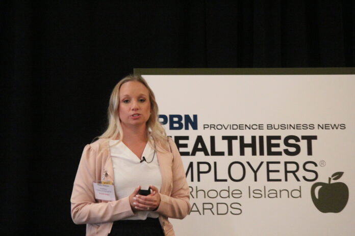 HALEY ELMORE, Healthiest Employers program coordinator for Indianapolis-based data analytics firm Springbuk, delivered the keynote address Thursday during Providence Business News 2022 Healthiest Employers of Rhode Island awards luncheon. / PBN PHOTO/JAMES BESSETTE