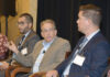 LAYING DOWN THE LAW: State Sen. Joshua Miller, D-Cranston, second from right, discusses a new Rhode Island law legalizing recreational marijuana use and its retail sales. Also on one of two panels at Providence Business News’ 2022 Business of Cannabis summit on Sept. 15 are, from left, Matthew Santacroce, R.I. Department of Business Regulation interim director; and Benjamin L. Rackliffe, a partner at Pannone Lopes Devereaux and O’Gara LLC. PBN PHOTO/MIKE SKORSKI