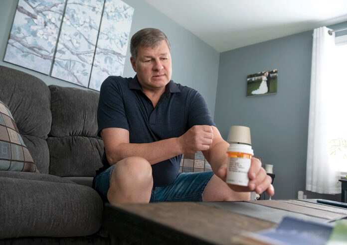 CUSTOM TREATMENT: Normand Audette, of Cumberland, had some of his lung tissue tested for biomarkers that allowed doctors to develop the most effective way to battle his cancer. Starting in 2024, such advanced testing will be covered by health insurers in Rhode Island.  PBN PHOTO/MICHAEL SALERNO