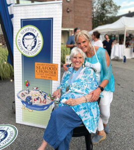 WINNING COMBO: Newport Chowder Co. founder Katie Potter, standing, is pictured with her mother, Muriel Barclay de Tolly, who was the inspiration for Potter’s company.  COURTESY MEREDITH MCBRIDE MOWRY