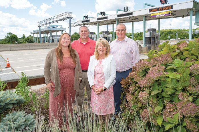 CLEAR LANE: The R.I. Turnpike and Bridge Authority implemented new technology to collect bridge tolls more efficiently. Pictured, from left, are R.I. Bridge and Turnpike Authority Director of Tolling Katie Coleman, Chief Financial Officer Jeff Goular, Executive Director Lori Caron Silveira and Director of Engineering Eric Seabury.  PBN PHOTO/DAVID HANSEN