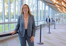 PRIME OPPORTUNITY: Amy Kacerik, dean of enrollment management at the Community College of Rhode Island, says few Amazon.com Inc. employees have enrolled using the tuition program called Career Choice, but that may change when the Amazon warehouse opens in Johnston next year, which will employ 1,500 people.  PBN PHOTO/ELIZABETH GRAHAM  