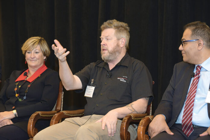 CYBER SPECIALISTS: Roger Williams University professor of cybersecurity Doug White, middle, speaks during a Q&A session at the end of Providence Business News’ 2022 Cybersecurity Summit at the Crowne Plaza Providence-Warwick on Oct. 6. At left is Linn F. Freedman, a certified information privacy professional and U.S. chair of data privacy and the cybersecurity team at Robinson & Cole LLP. At right is Shakour A. Abuzneid, a professor of cybersecurity and networking and incoming program director at RWU.  PBN PHOTO/MIKE SKORSKI