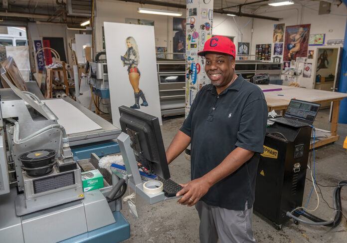 SEIZING THE MOMENT: After working as a technician in the printing business for more than a decade, Gary Wallace, owner of Hall of GraFX in Providence, jumped at the chance to start his own print shop when one of his customers decided to retire and Wallace purchased his printing equipment for $12,000. PBN PHOTO/MICHAEL SALERNO