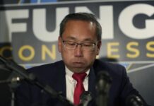 ALLAN W. FUNG reacts after losing the 2nd Congressional District race Nov. 8. / AP PHOTO/STEVEN SENNE