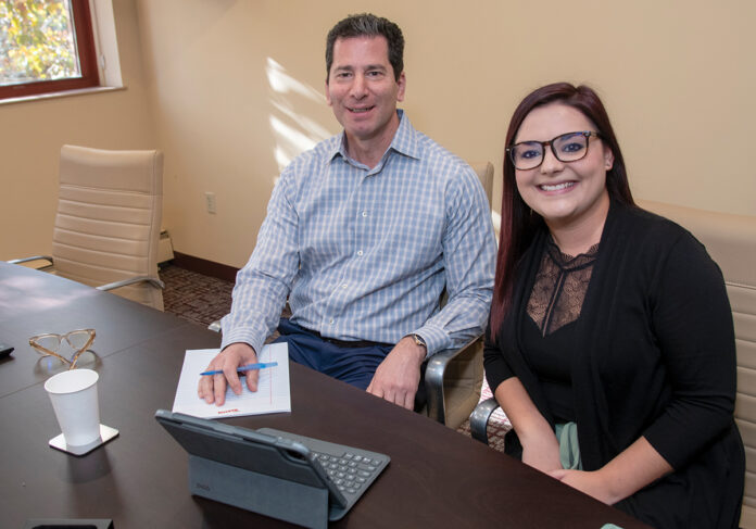 SPECIAL ­EXPERTISE: ­Steven Monacelli, an accountant with expertise in cannabis at Withum Smith+Brown PC in Providence, with Brittany Crosi, marketing ­coordinator. PBN PHOTO/­MICHAEL SALERNO