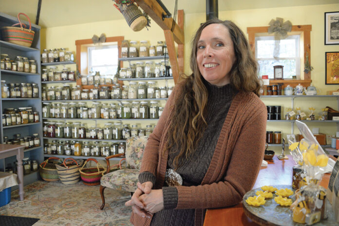 READY WITH A REMEDY: Herbalist Mary Blue has carved out a niche in the health sector, building a business that offers herb- derived tinctures, baths, syrups and teas, as well as classes on how to make them. PBN PHOTO/ ELIZABETH GRAHAM