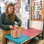 EAGER SELLER: Karen Beebe, owner of Providence’s Queen of Hearts LLC, says the only way for her to combat inflation this holiday season is for her fashion boutique to sell more than usual.  PBN FILE PHOTO/­MICHAEL SALERNO