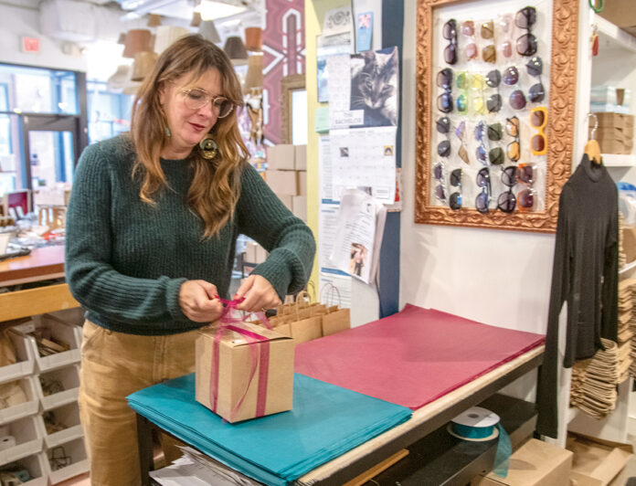 EAGER SELLER: Karen Beebe, owner of Providence’s Queen of Hearts LLC, says the only way for her to combat inflation this holiday season is for her fashion boutique to sell more than usual.  PBN FILE PHOTO/­MICHAEL SALERNO