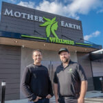 OPENING DAY: Eddie Keegan, left, chief operating officer, and Joseph Pakuris, co-owner, are ready to welcome customers on opening day at Mother Earth Wellness in Pawtucket. PBN PHOTO/MICHAEL SALERNO
