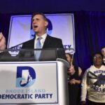 REP. SETH MAGAZINER, D-R.I., seen here delivering his victory speech Nov. 8, says he wants to prioritize lowering energy and drug costs, and improving education. / AP FILE PHOTO/MARK STOCKWELL