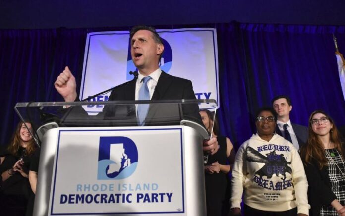 REP. SETH MAGAZINER, D-R.I., seen here delivering his victory speech Nov. 8, says he wants to prioritize lowering energy and drug costs, and improving education. / AP FILE PHOTO/MARK STOCKWELL