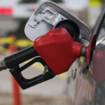 THE AVERAGE PRICE of self-serve, regular unleaded gasoline in Rhode Island has declined $3.25 per gallon, 1 cent less than last week but still 3 cents higher than the national average, according to AAA Northeast. / ASSOCIATED PRESS FILE PHOTO / DAVID ZALUBOWSKI / ASSOCIATED PRESS