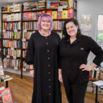 TURNING THE PAGE: Sisters Caroline Vericker and Mads Vericker gave up their jobs as librarians and opened Heartleaf Books in Providence in September. PBN PHOTO/TRACY JENKINS