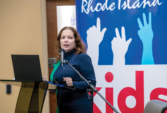 HELP WANTED: R.I. Education Commissioner Angélica Infante-Green, pictured speaking at a Rhode Island Kids Count event in January, has asked for assistance from the business community to improve Providence’s struggling schools.  PBN PHOTO/MICHAEL SALERNO