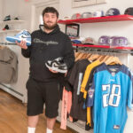 SCARCE SNEAKERS: Legit Sneakerheads LLC owner Ryan Enos resells rare, expensive sneakers out of his Woonsocket shop.  PBN PHOTO/MICHAEL SALERNO