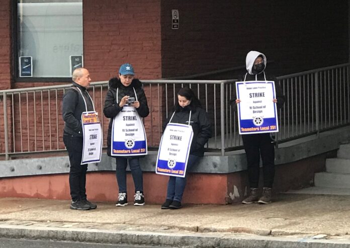 TEAMSTERS LOCAL 251 members who are employees at the Rhode Island School of Design picket outside a campus building Thursday morning. / PBN PHOTO/JAMES BESSETTE