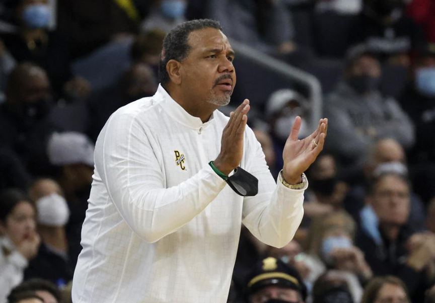 ED COOLEY, former Providence College men's basketball coach, was a major aspect in marketing the college during his 12 years at PC. / AP FILE PHOTO/MARY SCHWALM