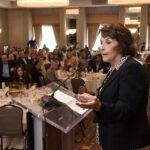 PAULA IACONO, executive director of the Chartercare Foundation who was named the 2023 Career Achiever in Providence Business News’ 2023 Business Women Awards program, delivers her speech during Thursday's awards luncheon at the Providence Marriott Downtown. / PBN PHOTO/MIKE SKORSKI