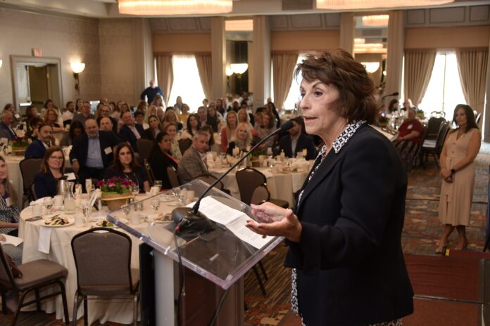 PAULA IACONO, executive director of the Chartercare Foundation who was named the 2023 Career Achiever in Providence Business News’ 2023 Business Women Awards program, delivers her speech during Thursday's awards luncheon at the Providence Marriott Downtown. / PBN PHOTO/MIKE SKORSKI