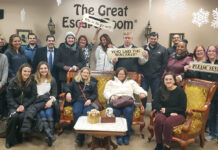 SUPER SLEUTHING: The staff at Citrin Cooperman & Co. LLP participate in an escape room activity.  COURTESY CITRIN COOPERMAN & CO. LLP