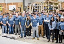 BUILDING THEIR SKILLS: Sweenor Builders Inc. team members pose for a photo after a training session in its custom millwork shop.  COURTESY SWEENOR BUILDERS INC.