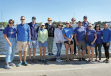 BAY DAY: The Washington Trust Co. employees support the Save The Bay Inc.’s International Coastal Cleanup initiative at Napatree Point in Westerly.  COURTESY THE WASHINGTON TRUST CO.