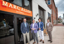 ALWAYS AVAILABLE: At Marc Allen Fine Clothiers in Providence, one of the team members is always available to help customers. Standing from left are Colin Ward, store manager; Marc Streisand, owner; Will Arvanites, director of operations; and Josh Jacob, director of tailored clothing.  PBN PHOTO/MICHAEL SALERNO